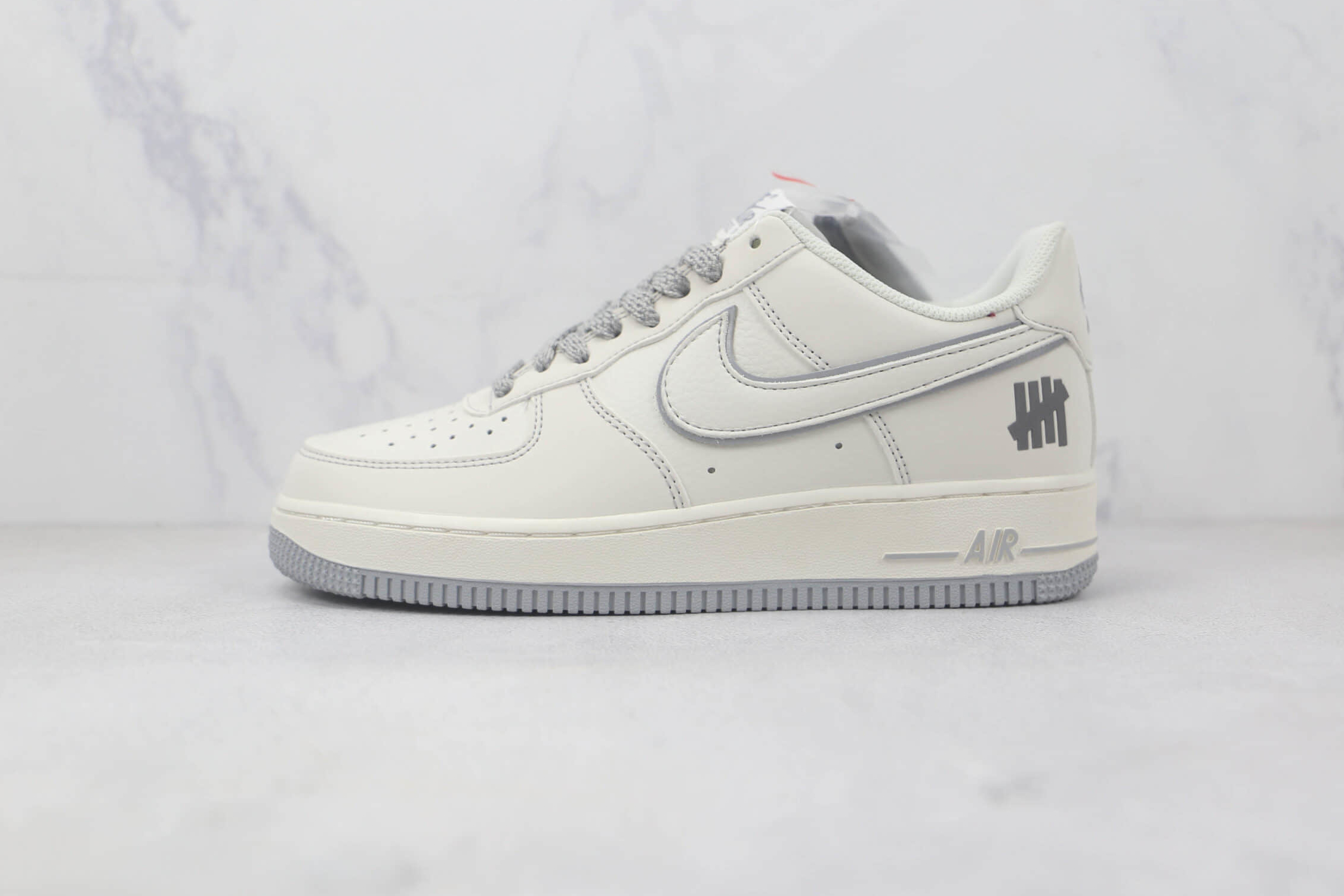 Undefeated x Nike Air Force 1 07 Low Cream Light Grey UN3699-055 - Limited Edition Sneakers